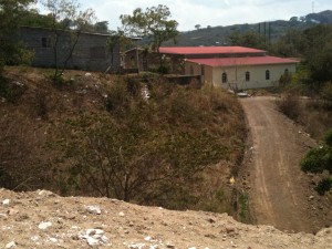 Working on the seminary land.  This shows the road connecting the church, school, and seminary propery.