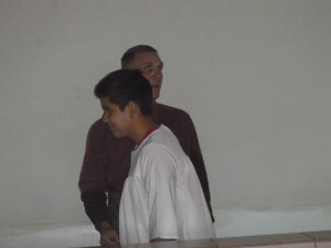 Bro. Sam about to baptize Luis