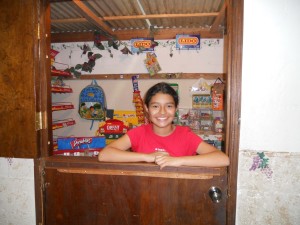 Daniela, one of our 6th graders in the school and faithful church girls, manning the pulperia (small store) during the fair!