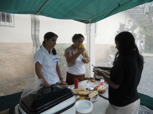 Waleska, Rebeca, and Kelin in charge of food sales