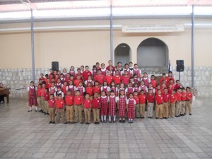 This picture is from the day before graduation and is of our entire student body practicing for the graduation program