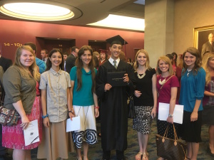 Joseph with his sisters, cousins, and friends who all shared in the day with him!