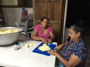 Church ladies helping with the preparation for the fellowship meal